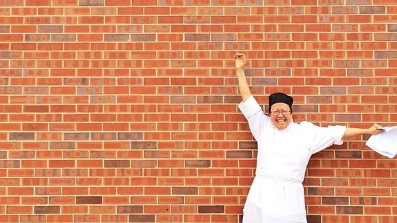 Marilyn Santos McNabb in a chef's outfit