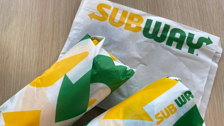 Subway wrapped sandwiches and napkin