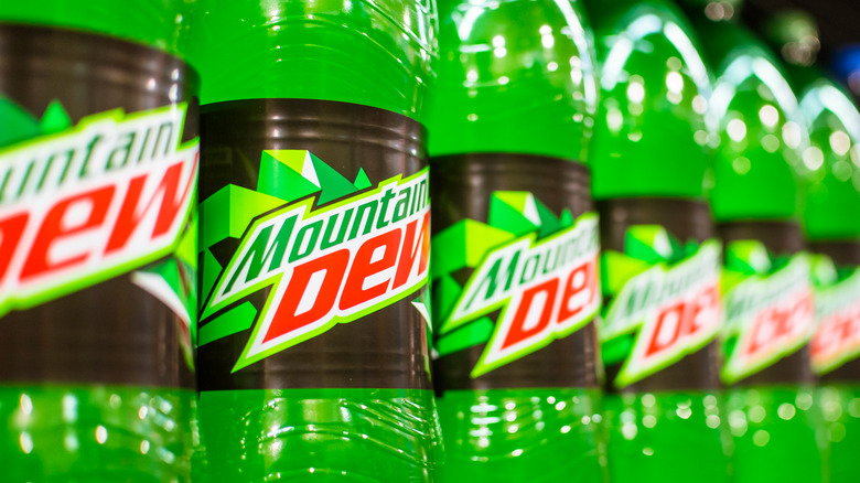 Rows of green Mountain Dew bottles