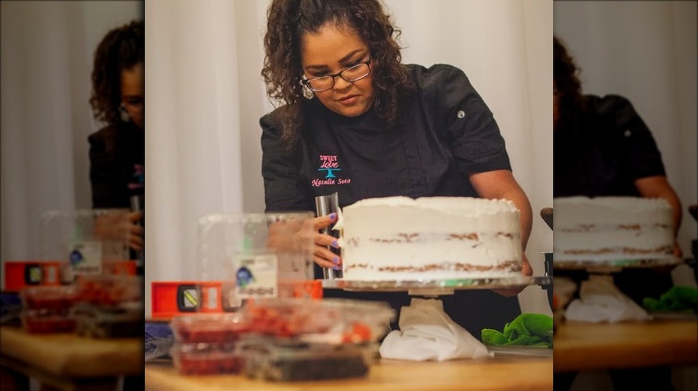 Natalie Soto working on a cake