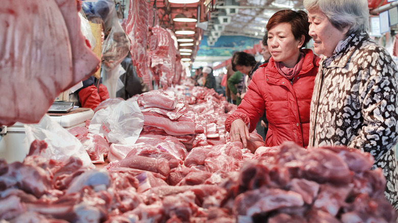 Raw rat meat in market