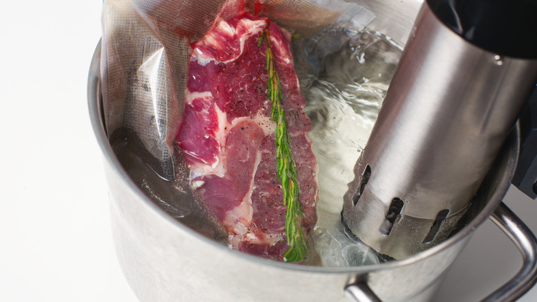 meat in sous vide cooker  