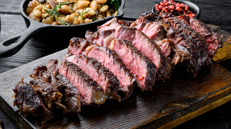 cut steak on a board