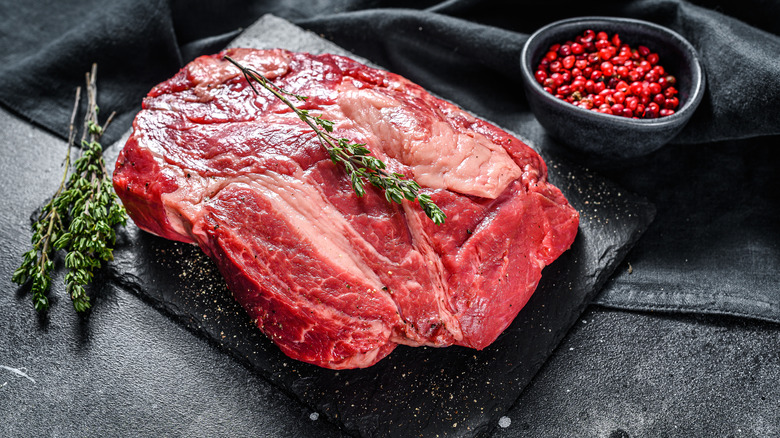 thick steak on table