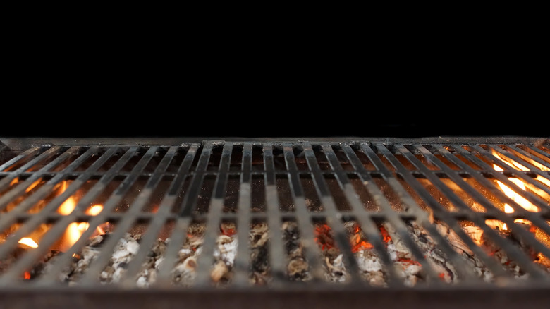 Barbecue grill with flame