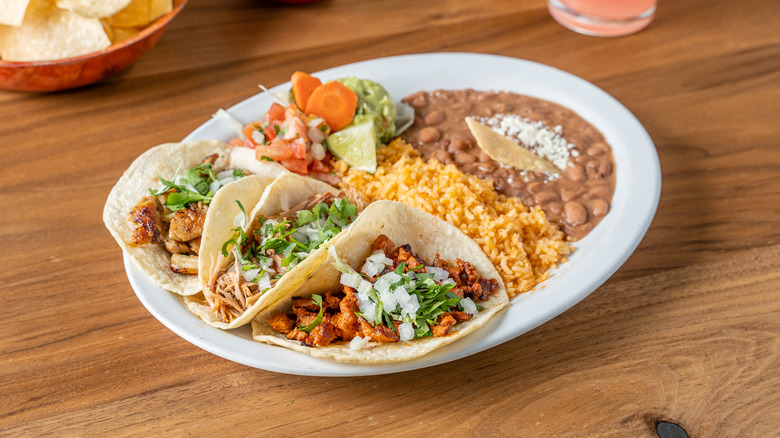 taco combo plate with beans and rice