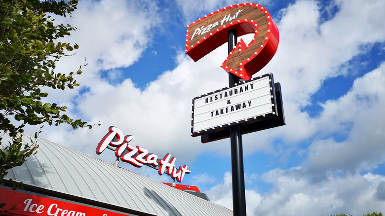 Pizza Hut sign and restaurant 