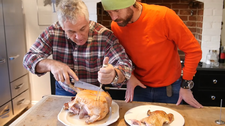 Paul Kelly demonstrating his turkey carving technique