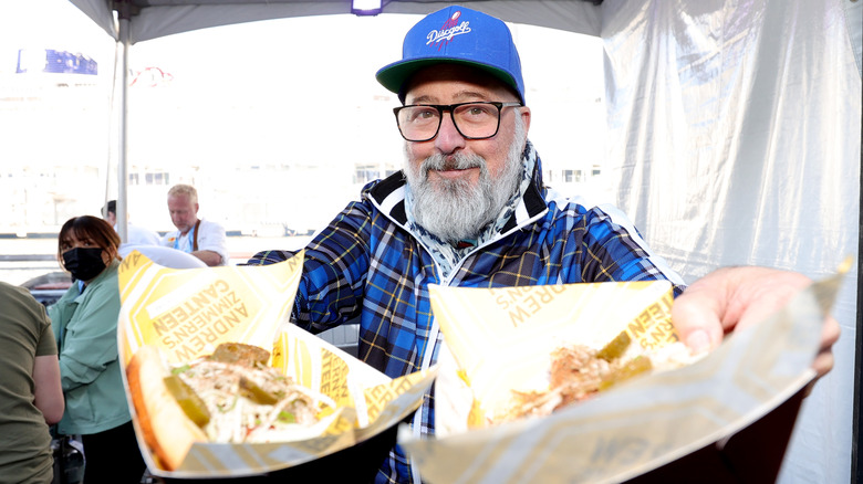 andrew zimmern serving food