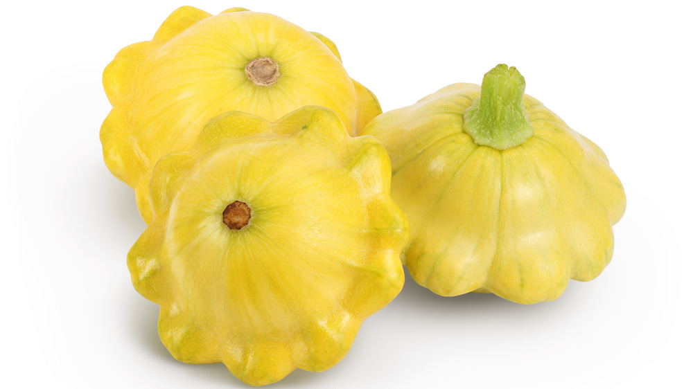 Pattypan squash on a white background