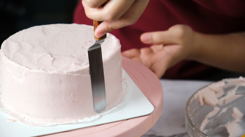 Frosting a cake