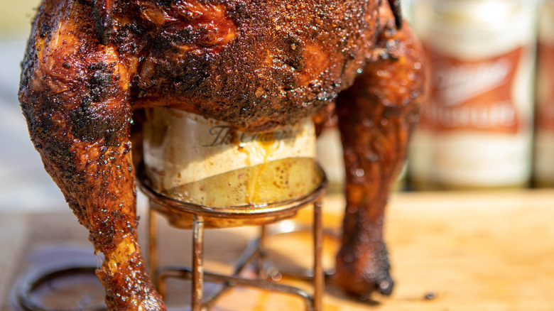 Grilled chicken stuffed with beer can