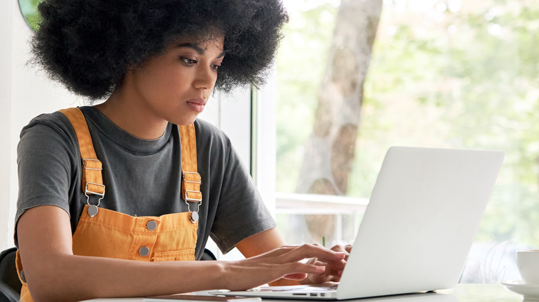 woman working on laptop