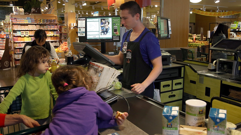 little girls at whole foods checkout