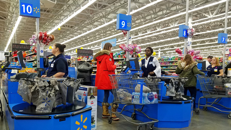 Customers in Walmart checkout lines