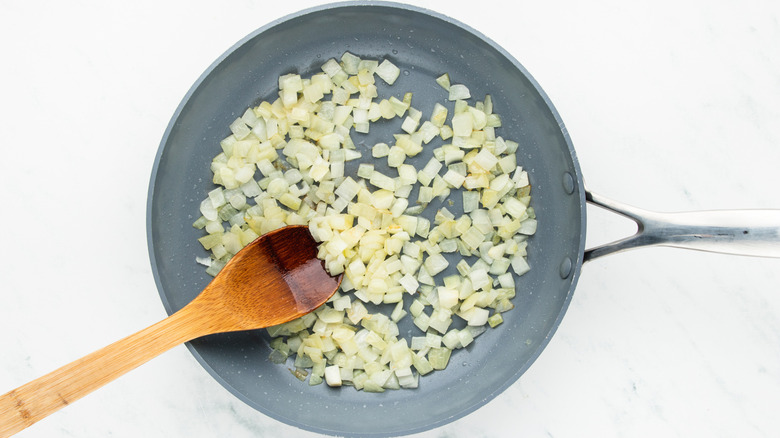 onion sauteing in pan