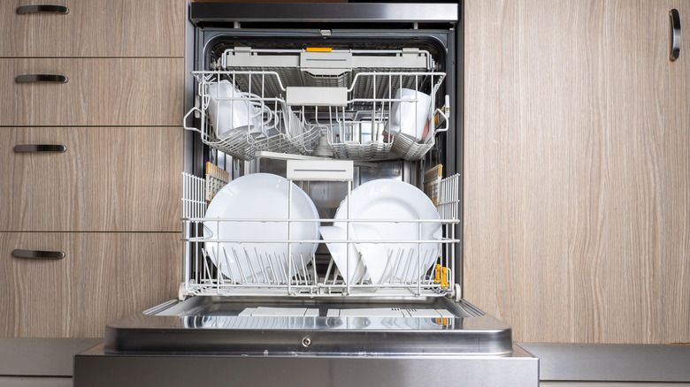 Clean dishes in dishwasher