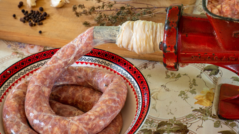 sausage with casing on stuffing machine