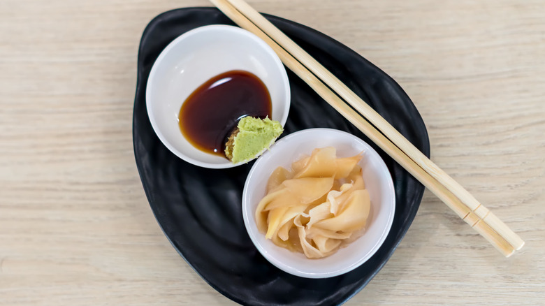 Chopsticks, soy sauce, and wasabi 