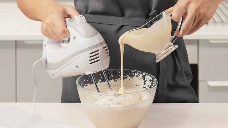 Baker making royal icing