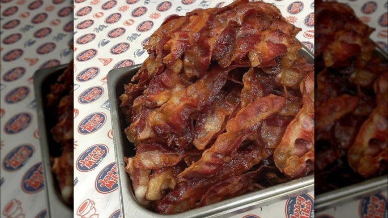 container of fried bacon