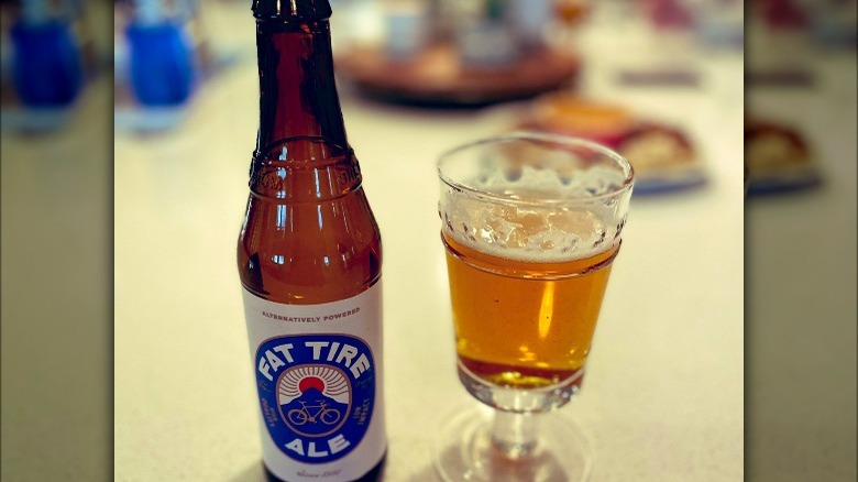 Fat Tire bottle beside filled glass