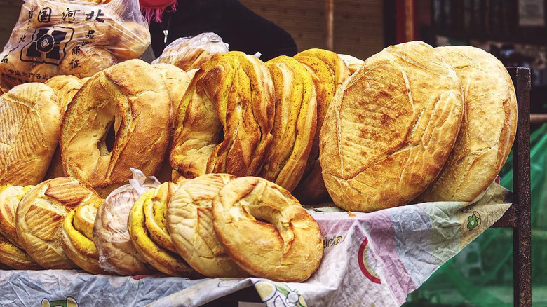 bread for sale on street stand in tibet