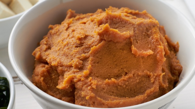 Miso paste in white bowl