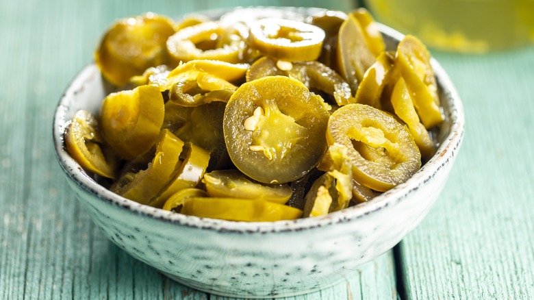 Sliced jalapenos in a bowl