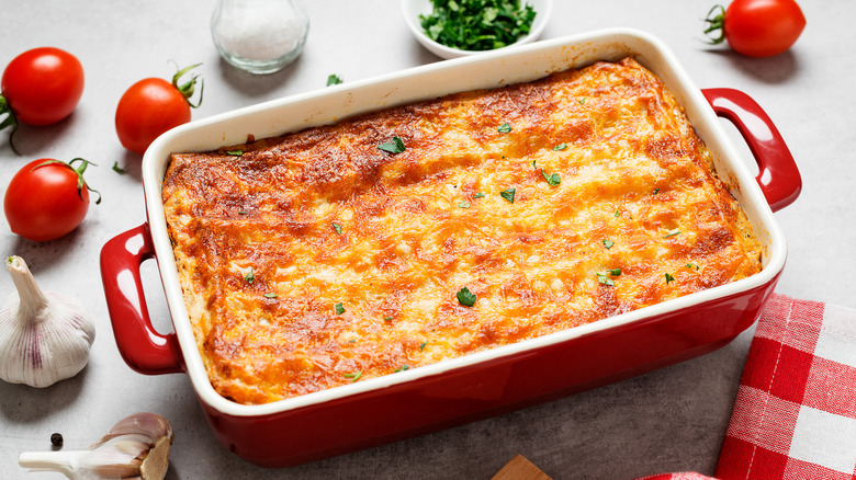 Lasagna in a red baking dish