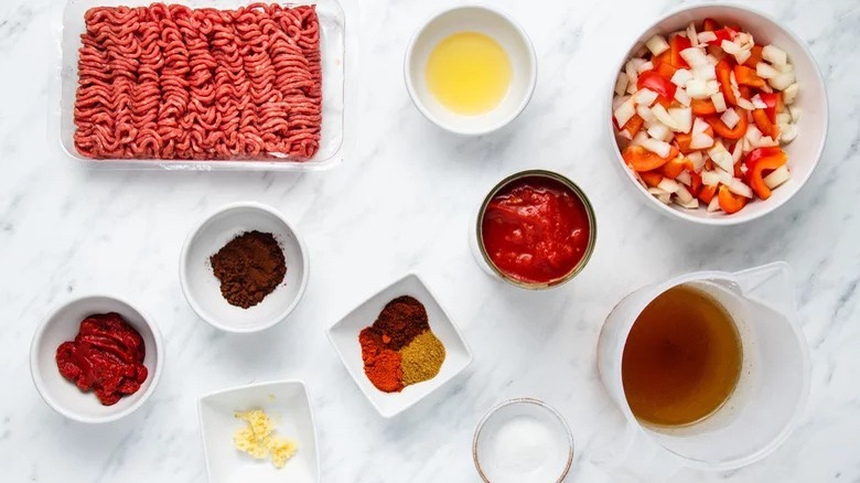 Chili ingredients on marble countertop