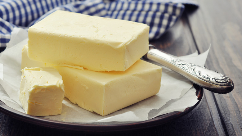 Butter on plate with silverware