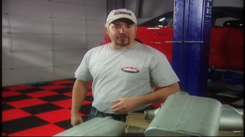 A younger Guy Fieri selling mufflers