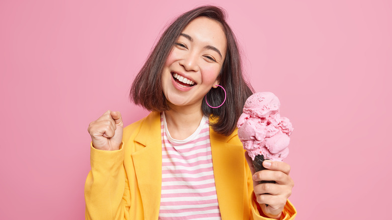 woman with strawberry ice cream cone
