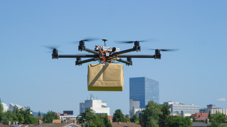 Drone carrying a bag