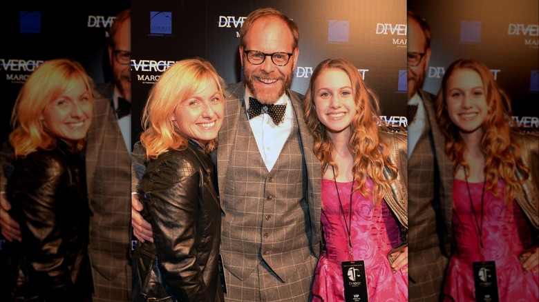 Alton Brown posing with family