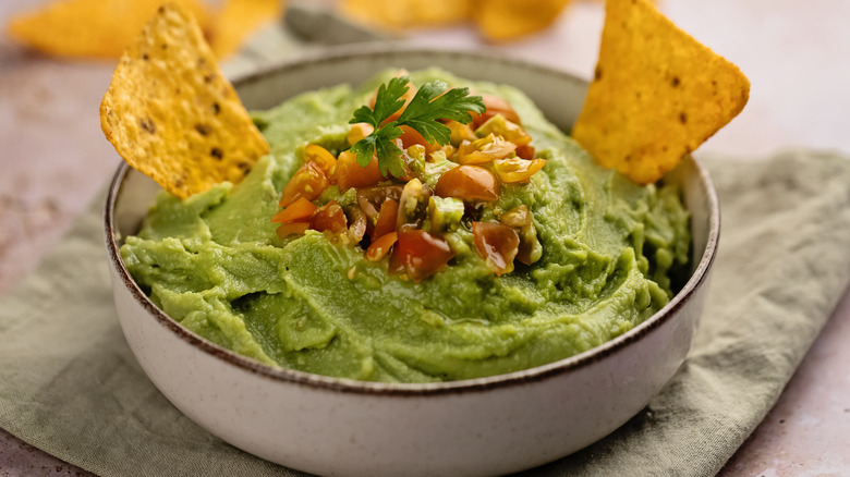 guacamole bowl with chips