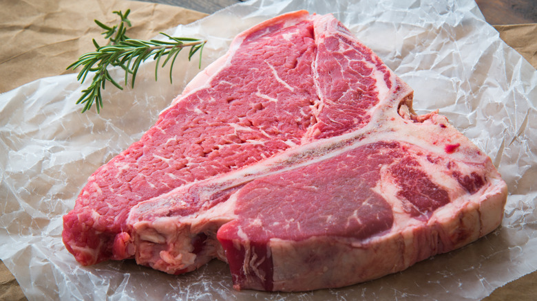 raw porterhouse steak rosemary