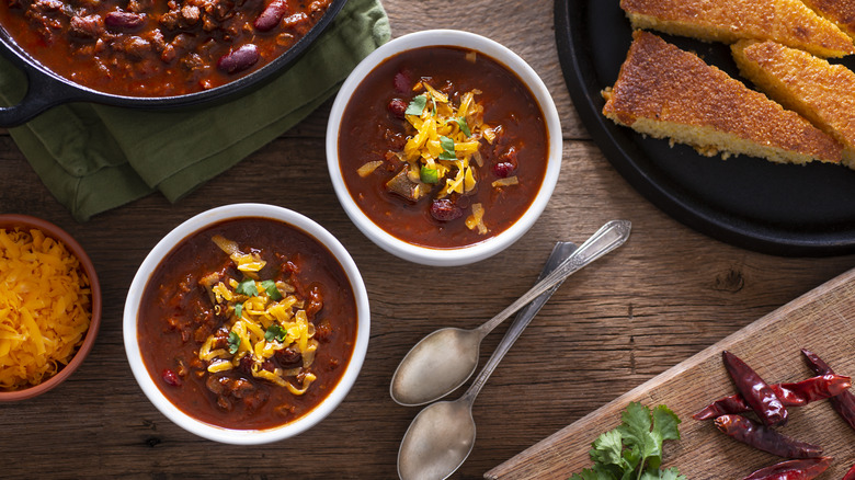 bowls of chili and cornbread