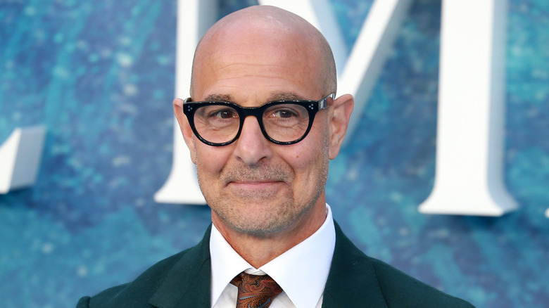 Stanley Tucci smiling at event