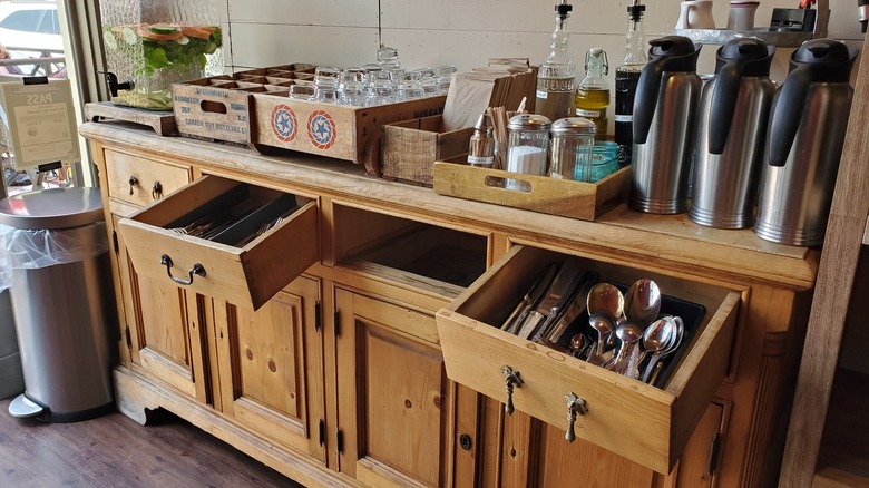 Antique sideboard with utensils