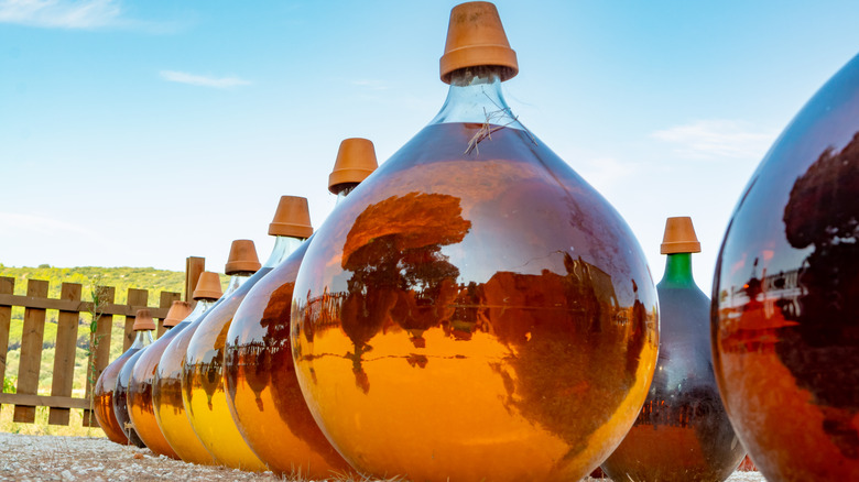 Wine in demijohn bottles