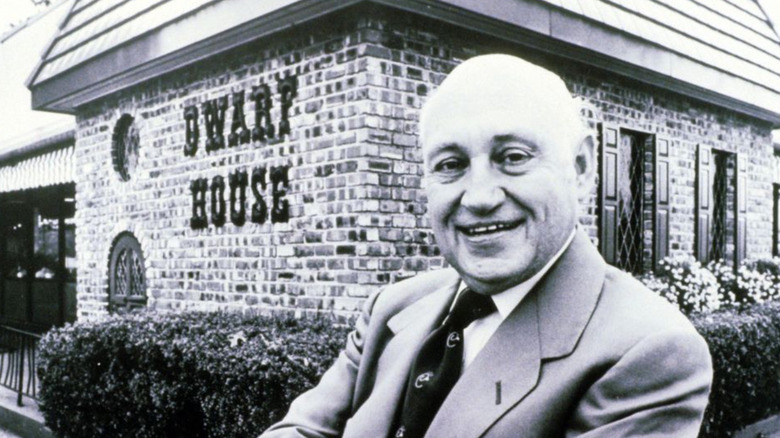 Truett Cathy in front of The Dwarf House 