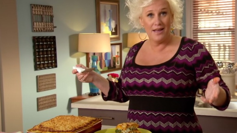 Anne Burrell preparing lasagna