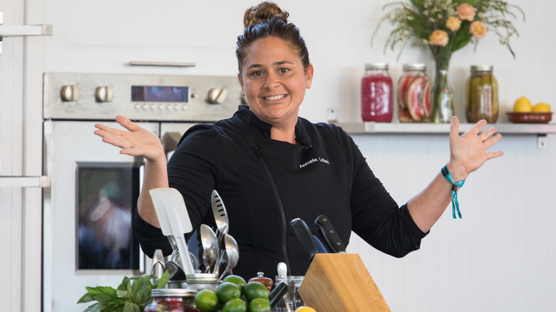 Black Market Liquor Bar's Antonia Lofaso in a black chefs coat