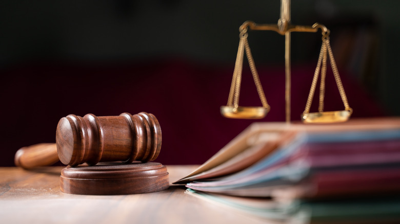 gavel and scales of justice on desk