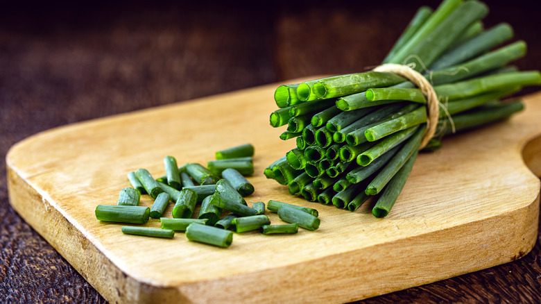 Chives on cutting board