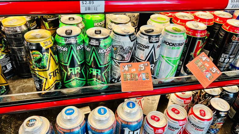 different energy drink brands on a store shelf