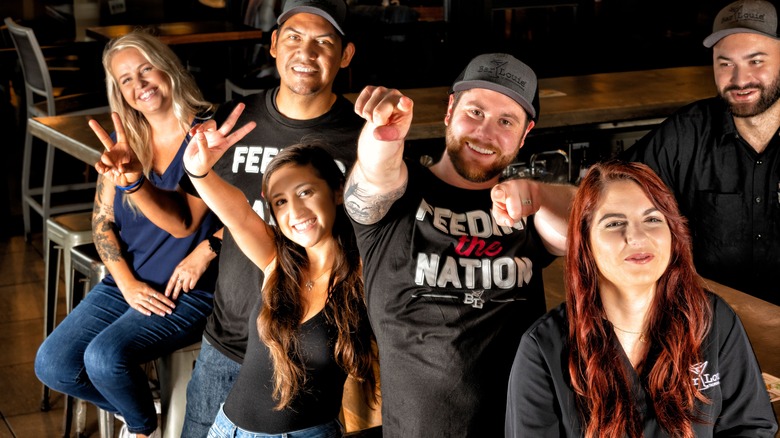 Bar Louie Staff smiling and posing