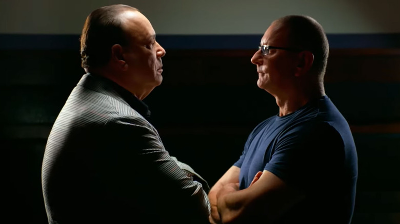 Jon Taffer and Robert Irvine facing 